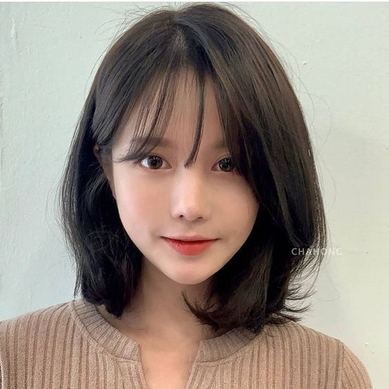 Hình ảnh girl xinh xinh xắn với mái tóc ngắn dễ thương và dễ thương